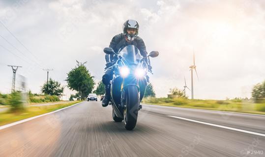 motorbike on the road riding fast. having fun driving the empty road on a motorcycle tour journey.   : Stock Photo or Stock Video Download rcfotostock photos, images and assets rcfotostock | RC Photo Stock.: