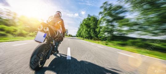 motorbike on the road riding. having fun driving the empty road on a motorcycle tour journey. copyspace for your individual text.  : Stock Photo or Stock Video Download rcfotostock photos, images and assets rcfotostock | RC Photo Stock.:
