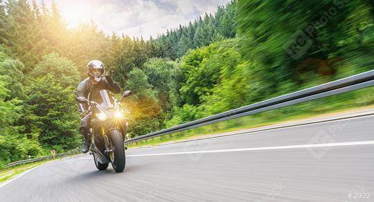 motorbike on the road riding. having fun driving the empty road on a motorcycle tour journey. copyspace for your individual text.   : Stock Photo or Stock Video Download rcfotostock photos, images and assets rcfotostock | RC Photo Stock.: