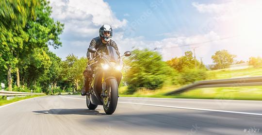 motorbike on the road riding. having fun driving the empty road on a motorcycle tour journey. copyspace for your individual text.  : Stock Photo or Stock Video Download rcfotostock photos, images and assets rcfotostock | RC Photo Stock.: