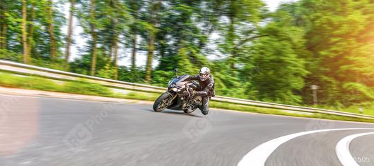 motorbike on the road riding. having fun riding the empty road on a motorcycle tour / journey  : Stock Photo or Stock Video Download rcfotostock photos, images and assets rcfotostock | RC Photo Stock.: