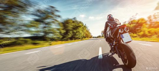 motorbike on the road riding high speed. having fun riding the empty road on a motorcycle tour / journey  : Stock Photo or Stock Video Download rcfotostock photos, images and assets rcfotostock | RC Photo Stock.: