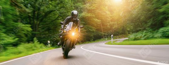 motorbike riding on the forest road. driving on the empty road on a motorcycle trip. copyspace for your individual text.  : Stock Photo or Stock Video Download rcfotostock photos, images and assets rcfotostock | RC Photo Stock.: