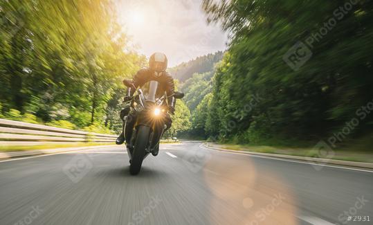 motorbike riding on the road in the mountains. driving on the empty road on a motorcycle trip. copyspace for your individual text.  : Stock Photo or Stock Video Download rcfotostock photos, images and assets rcfotostock | RC Photo Stock.: