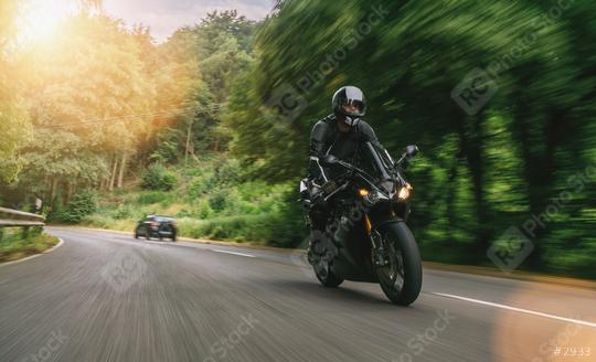 motorbike riding on the road in the mountains. driving on the empty road on a motorcycle tour. copyspace for your individual text.  : Stock Photo or Stock Video Download rcfotostock photos, images and assets rcfotostock | RC Photo Stock.: