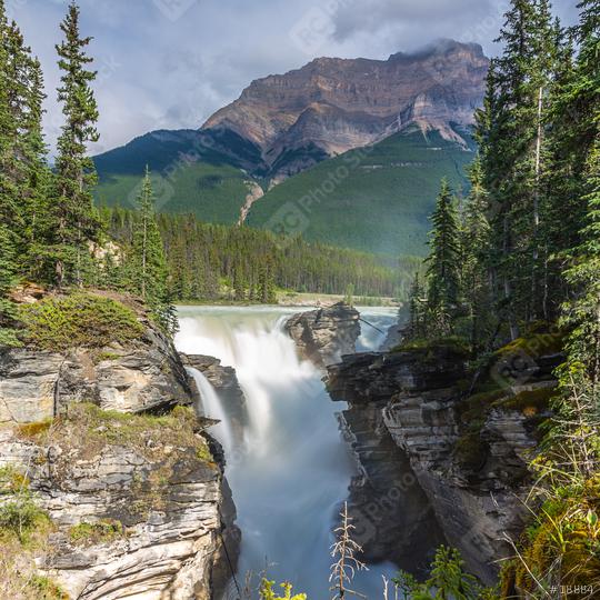 Mountains, rivers and waterfalls make up magnificent landscapes. Jasper Park. Rocky Mountains of Canada. Athabasca Falls. Travel, ecological and photo tourism concept  : Stock Photo or Stock Video Download rcfotostock photos, images and assets rcfotostock | RC Photo Stock.: