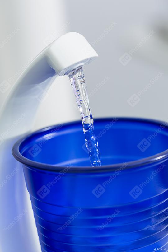 Mouthwash cup in fill with water at dental clinic  : Stock Photo or Stock Video Download rcfotostock photos, images and assets rcfotostock | RC Photo Stock.: