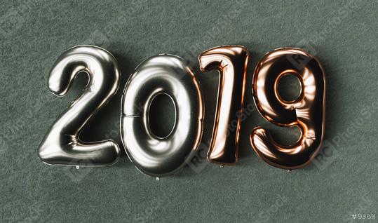 New year 2019 celebration. copper metallic silver numeral 2019 on black background. New Year
