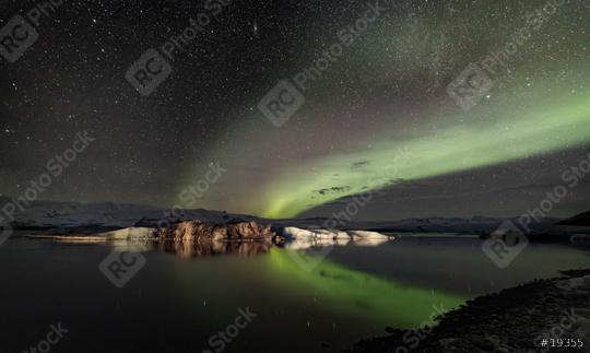 Nordlichter über Jökulsarlon, Gletscherlagune, Island mit Eisblock  : Stock Photo or Stock Video Download rcfotostock photos, images and assets rcfotostock | RC Photo Stock.: