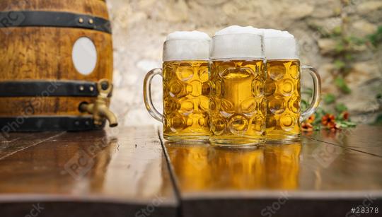 Oktoberfest beer glasses full of german beer with wooden barrel, Munich, Germany  : Stock Photo or Stock Video Download rcfotostock photos, images and assets rcfotostock | RC Photo Stock.: