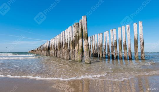 old wooden breakwaters on the Netherlands beach at summer  : Stock Photo or Stock Video Download rcfotostock photos, images and assets rcfotostock | RC Photo Stock.: