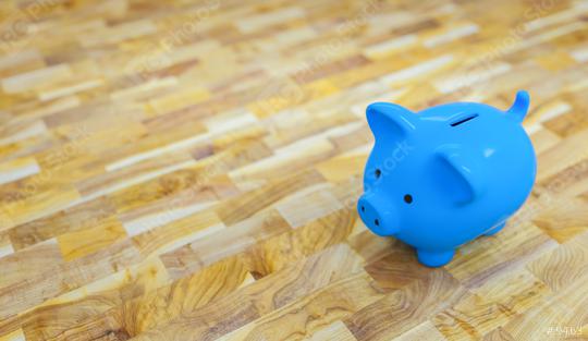 olf wooden floor with a blue piggy bank  - copyspace for your individual text.  : Stock Photo or Stock Video Download rcfotostock photos, images and assets rcfotostock | RC Photo Stock.: