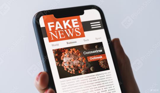 Online Corona Fake news on a mobile phone. Close up of woman reading Fake news or articles about covid-19 in a smartphone screen application. Hand holding smart device. Mockup. COVID19 nCov Outbreak.  : Stock Photo or Stock Video Download rcfotostock photos, images and assets rcfotostock | RC Photo Stock.: