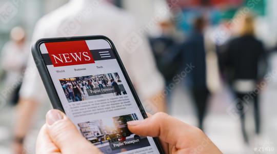 Online news on a mobile phone. Close up of businesswoman reading news or articles in a smartphone screen application. Hand holding smart device. Mockup website. Newspaper and portal on internet.  : Stock Photo or Stock Video Download rcfotostock photos, images and assets rcfotostock | RC Photo Stock.:
