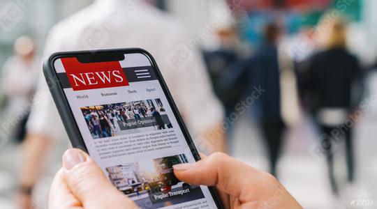 Online news on a mobile phone. Close up of businesswoman reading news or articles in a smartphone screen application. Hand holding smart device. Mockup website. Newspaper and portal on internet.  : Stock Photo or Stock Video Download rcfotostock photos, images and assets rcfotostock | RC Photo Stock.: