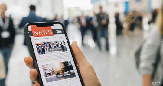 Online news on a mobile smartphone. Close up of businesswoman reading news or articles in a smartphone screen application. Hand holding smart device. Mockup website. Newspaper and portal on internet.  : Stock Photo or Stock Video Download rcfotostock photos, images and assets rcfotostock | RC Photo Stock.: