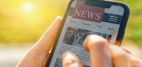 Online news on mobile phone. Close up of smartphone screen. Woman reading articles in application. Hand holding smart device. Mockup website. Newspaper and portal on internet.  : Stock Photo or Stock Video Download rcfotostock photos, images and assets rcfotostock | RC Photo Stock.: