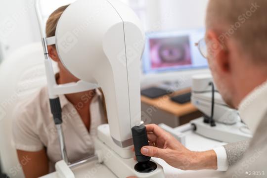 Optometrist administering with Keratograph an eye test to a female patient at the ophthalmology clinic. Close-up photo. Healthcare and medicine concept  : Stock Photo or Stock Video Download rcfotostock photos, images and assets rcfotostock | RC Photo Stock.: