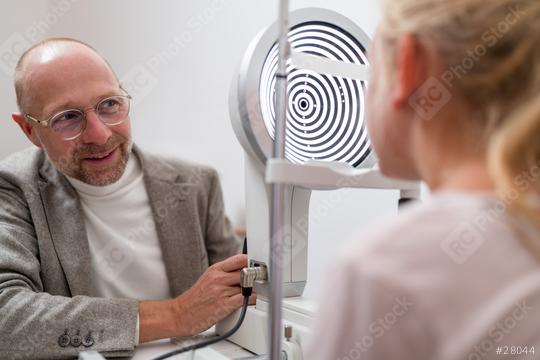 Optometrist conducting a vision test to a child with a keratograph or phoropter at the ophthalmology clinic. Close-up photo. Healthcare and medicine concept  : Stock Photo or Stock Video Download rcfotostock photos, images and assets rcfotostock | RC Photo Stock.: