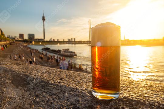 original Dusseldorfer Altbier (German traditionally beer) at the rhine shore  : Stock Photo or Stock Video Download rcfotostock photos, images and assets rcfotostock | RC Photo Stock.: