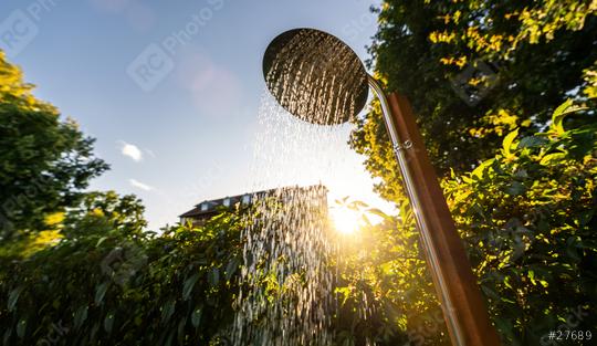 Outdoor shower head stick on the wooden pole design for showering body before jumping in the resort pool. Golden Hour Refreshment Spa wellness concept image  : Stock Photo or Stock Video Download rcfotostock photos, images and assets rcfotostock | RC Photo Stock.: