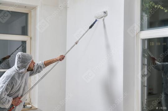painter working with paint roller to paint the wall of a room. do it yourself concept image   : Stock Photo or Stock Video Download rcfotostock photos, images and assets rcfotostock | RC Photo Stock.: