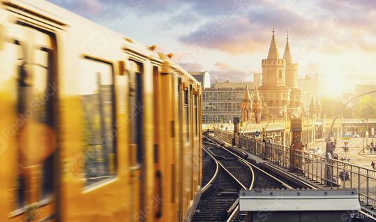 Panoramic view of Berliner U-Bahn with Oberbaum Bridge in the background in golden evening light at sunset with dramatic clouds, Berlin Friedrichshain-Kreuzberg  : Stock Photo or Stock Video Download rcfotostock photos, images and assets rcfotostock | RC Photo Stock.: