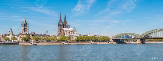 Panoramic view of the Cologne Cathedral with Hohenzollern Bridge and Rhine River in Germany, the church Great St. Martin at the left side  : Stock Photo or Stock Video Download rcfotostock photos, images and assets rcfotostock | RC Photo Stock.: