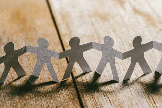 Paper People Holding Hands on a wooden table  : Stock Photo or Stock Video Download rcfotostock photos, images and assets rcfotostock | RC Photo Stock.: