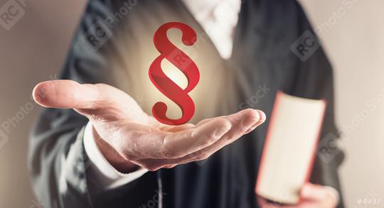paragraph sign in hands of a judge - law concept image  : Stock Photo or Stock Video Download rcfotostock photos, images and assets rcfotostock | RC Photo Stock.: