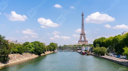 Paris Eiffel Tower and river Seine at summer in Paris, France. Eiffel Tower is one of the most iconic landmarks of Paris.  : Stock Photo or Stock Video Download rcfotostock photos, images and assets rcfotostock | RC Photo Stock.: