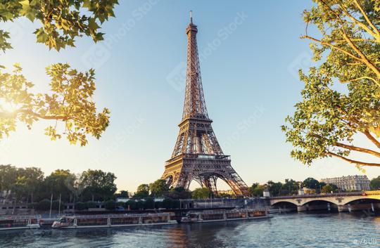 Paris Eiffel Tower and river Seine at sunset in Paris, France. Eiffel Tower is one of the most iconic landmarks of Paris.  : Stock Photo or Stock Video Download rcfotostock photos, images and assets rcfotostock | RC Photo Stock.: