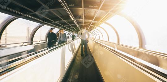passenger rushing through an escalator in airport terminal   : Stock Photo or Stock Video Download rcfotostock photos, images and assets rcfotostock | RC-Photo-Stock.: