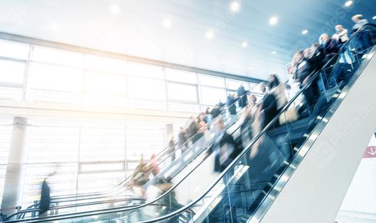 people at a moving escalator on a traid fair  : Stock Photo or Stock Video Download rcfotostock photos, images and assets rcfotostock | RC Photo Stock.: