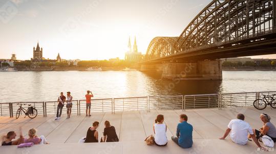 people spending their vacation in Cologne at sunset  : Stock Photo or Stock Video Download rcfotostock photos, images and assets rcfotostock | RC Photo Stock.: