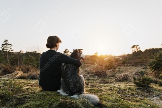 Person hugging a dog outdoors in beautiful nature. They enjoy the sunset. Emotional connection with trust. Happy content time together. Friendship between humans and dogs. Hugs.  : Stock Photo or Stock Video Download rcfotostock photos, images and assets rcfotostock | RC Photo Stock.: