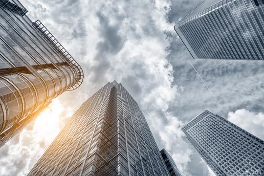 Perspective and underside angle view modern glass building skyscrapers over cloudy sky  : Stock Photo or Stock Video Download rcfotostock photos, images and assets rcfotostock | RC Photo Stock.: