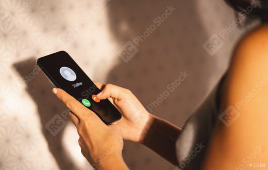 Phone call from a anonymous stalker. Stalking or bullying with phone concept. Stalker caller, scammer or stranger. Woman answering to incoming call. Ex boyfriend with fake identity.  : Stock Photo or Stock Video Download rcfotostock photos, images and assets rcfotostock | RC Photo Stock.: