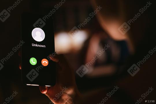 Phone call from unknown number late at night. Scam, fraud or phishing with smartphone concept. Prank caller, scammer or stranger. Woman answering to incoming call. Hoax person with fake identity.  : Stock Photo or Stock Video Download rcfotostock photos, images and assets rcfotostock | RC Photo Stock.: