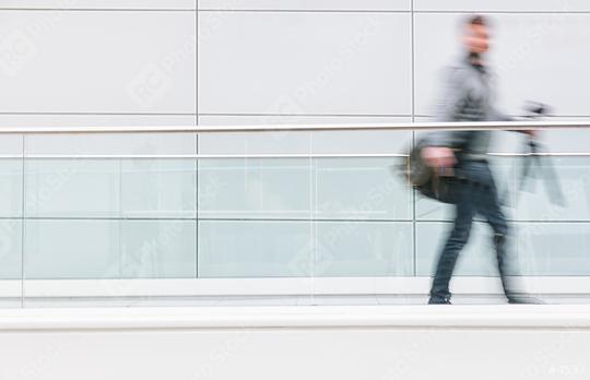 photographer with tripod walking in a futuristic corridor, including Copy space  : Stock Photo or Stock Video Download rcfotostock photos, images and assets rcfotostock | RC Photo Stock.: