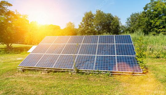 photovoltaic solar power panel on a field with sky, green clean Alternative power energy concept.  : Stock Photo or Stock Video Download rcfotostock photos, images and assets rcfotostock | RC Photo Stock.: