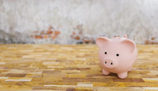 Piggy bank in a room with brick wall, copyspace for your individual text.  : Stock Photo or Stock Video Download rcfotostock photos, images and assets rcfotostock | RC Photo Stock.: