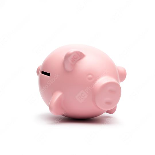 Piggy bank lying on the side isolated on white background  : Stock Photo or Stock Video Download rcfotostock photos, images and assets rcfotostock | RC Photo Stock.: