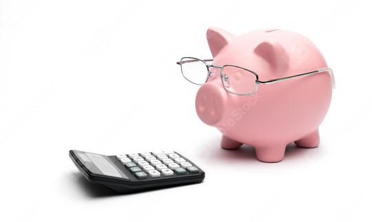 Piggy Bank with calculator on white background  : Stock Photo or Stock Video Download rcfotostock photos, images and assets rcfotostock | RC Photo Stock.: