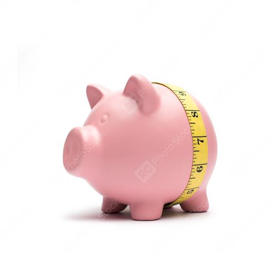 Piggy bank with tape measure on white background  : Stock Photo or Stock Video Download rcfotostock photos, images and assets rcfotostock | RC Photo Stock.: