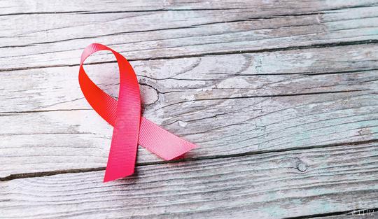Pink ribbon - symbol of awareness and support for those living with HIV  : Stock Photo or Stock Video Download rcfotostock photos, images and assets rcfotostock | RC Photo Stock.: