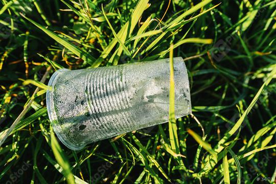 Plastic cup pollution on a meadow  : Stock Photo or Stock Video Download rcfotostock photos, images and assets rcfotostock | RC Photo Stock.:
