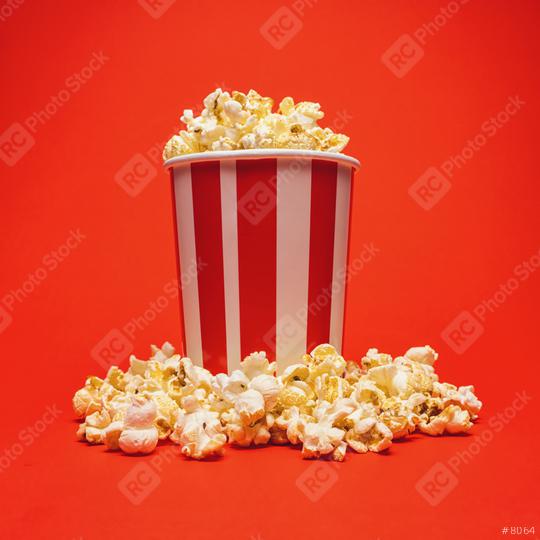 Popcorn in a box around on a bright red background  : Stock Photo or Stock Video Download rcfotostock photos, images and assets rcfotostock | RC Photo Stock.: