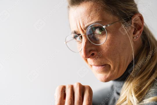 Portrait of an upset, angry and unhappy casual women look over the shoulder face expression emotion reaction  : Stock Photo or Stock Video Download rcfotostock photos, images and assets rcfotostock | RC Photo Stock.:
