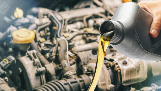Pour motor oil into car engine. Maintenance service change liquids and fluid.  : Stock Photo or Stock Video Download rcfotostock photos, images and assets rcfotostock | RC Photo Stock.: